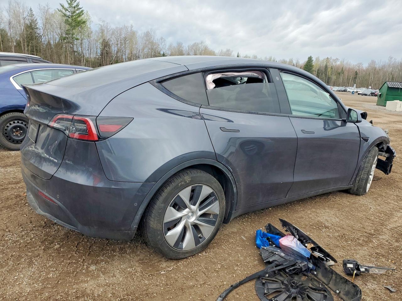 7SAYGDEE4NF504945 · 2022 TESLA MODEL Y · 3/13