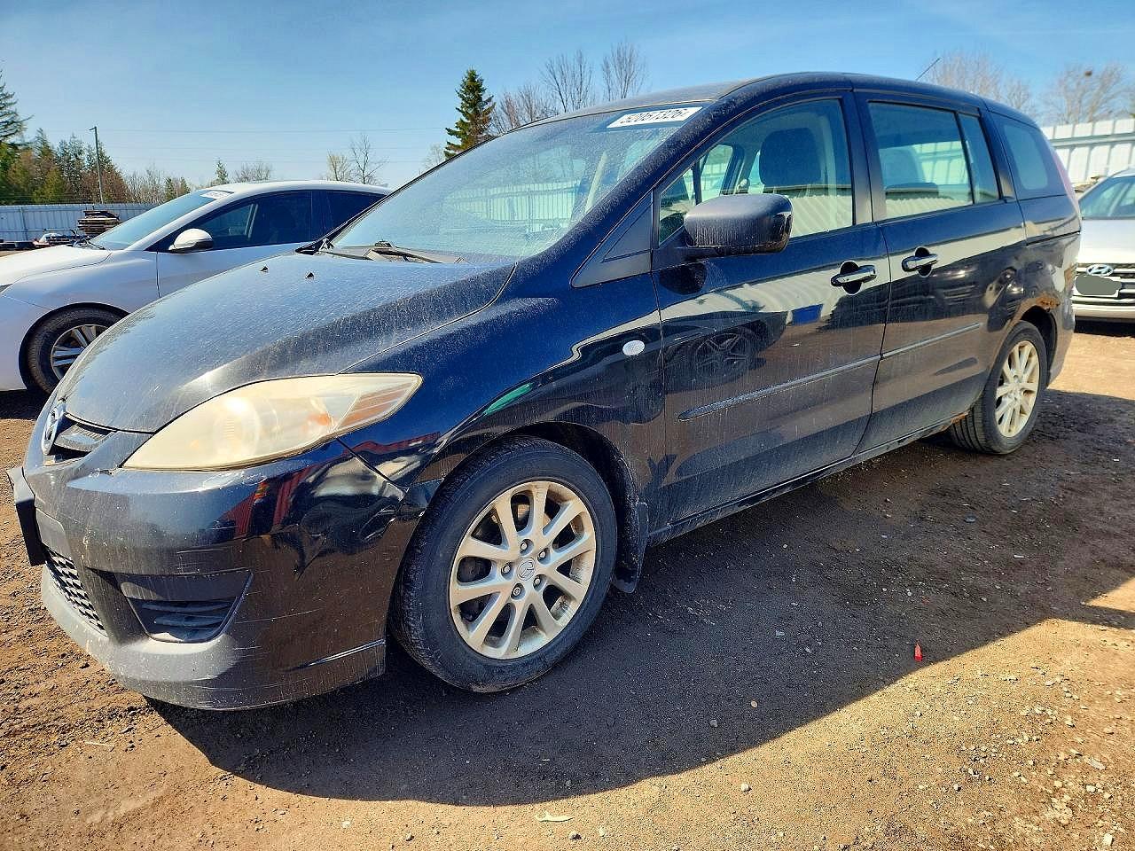 JM1CR293390350831 · 2009 MAZDA 5