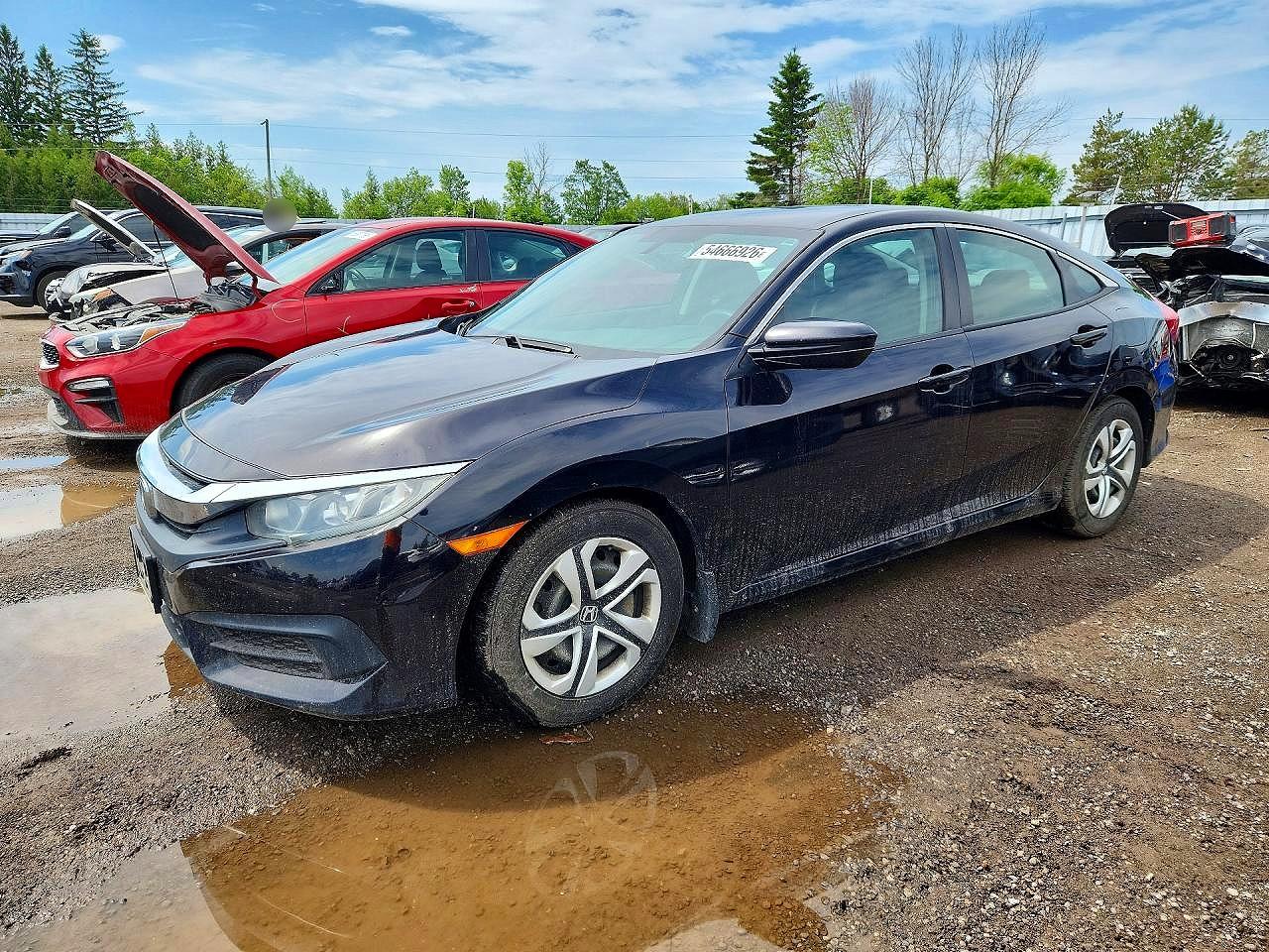 2HGFC2F59GH018648 · 2016 HONDA CIVIC