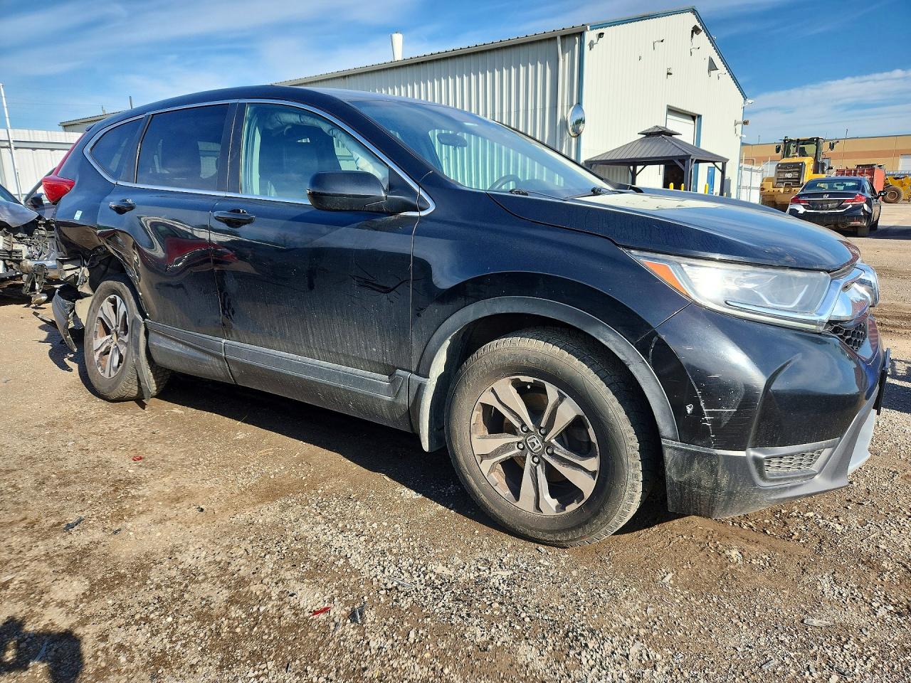 2HKRW2H20JH113765 · 2018 HONDA CR-V · 4/14