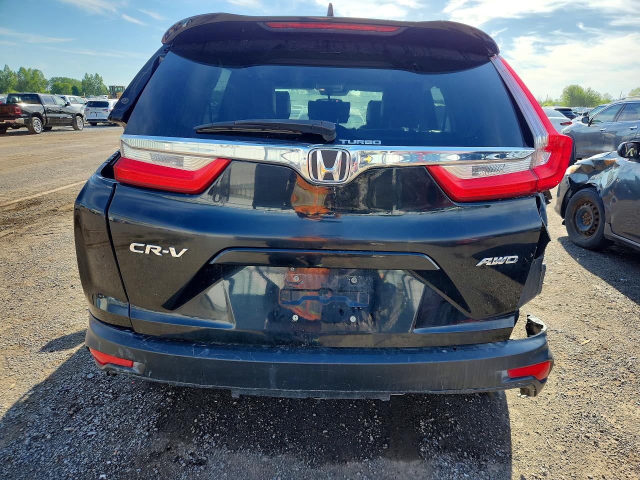 2HKRW2H20JH113765 · 2018 HONDA CR-V · 6/14