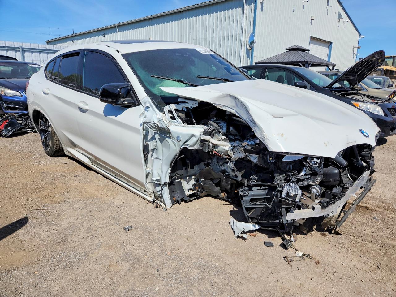 5YMUJ0C00M9E73161 · 2021 BMW X4 · 4/14