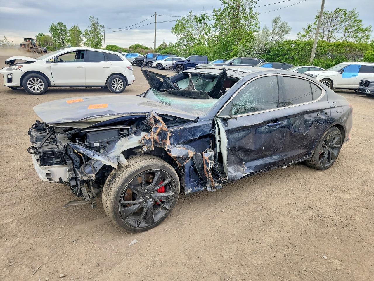 KMTG54TE5NU083537 · 2022 GENESIS G70