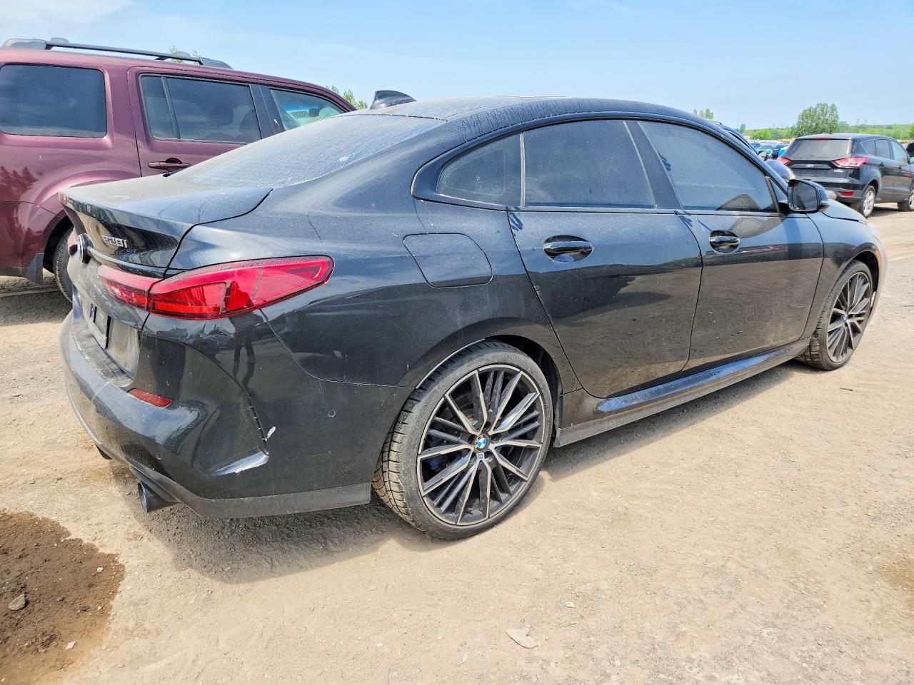 WBA73AK09M7G52623 · 2021 BMW 228I · 3/12