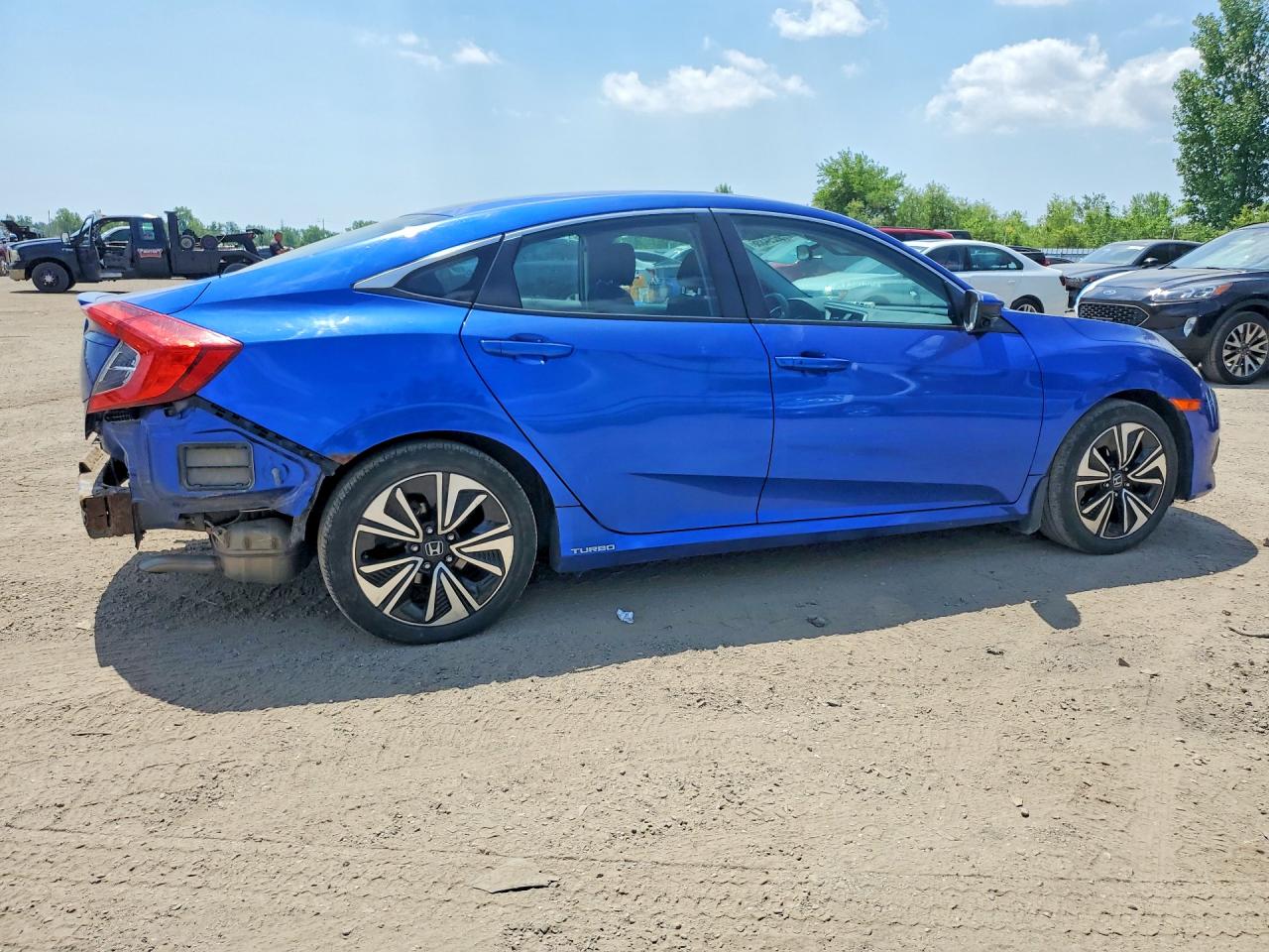 2HGFC1F48HH104052 · 2017 HONDA CIVIC · 3/13