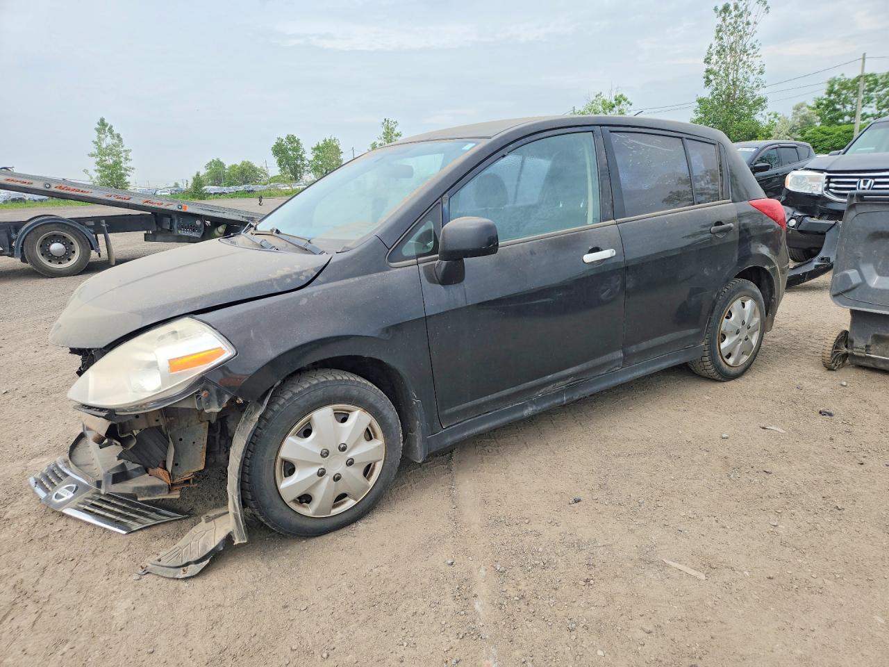 3N1BC13E59L477703 · 2009 NISSAN VERSA