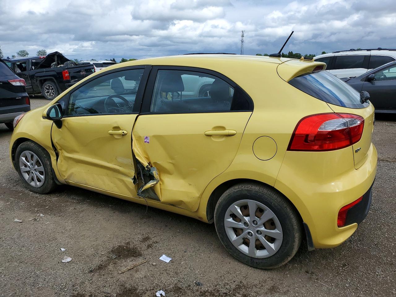KNADM5A35G6590986 · 2016 KIA RIO · 2/12