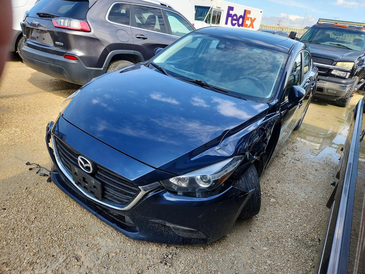 JM1BN1V75J1165978 · 2018 MAZDA 3