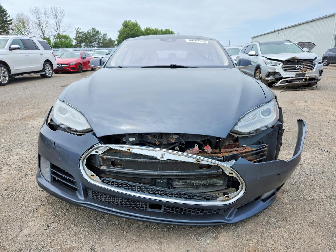 5YJSA1H20FF098975 · 2015 TESLA MODEL S · 5/12