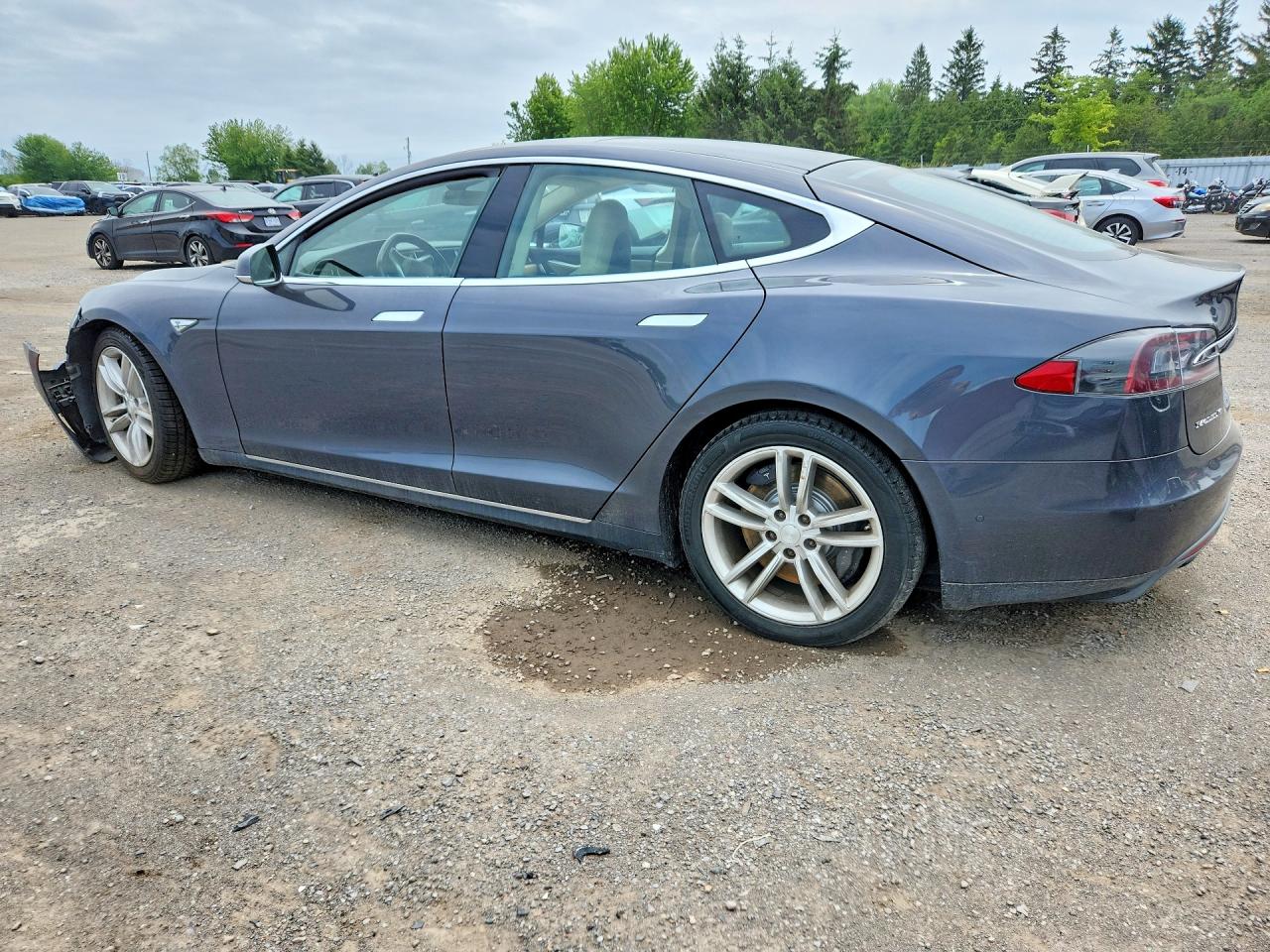 5YJSA1H20FF098975 · 2015 TESLA MODEL S · 2/12
