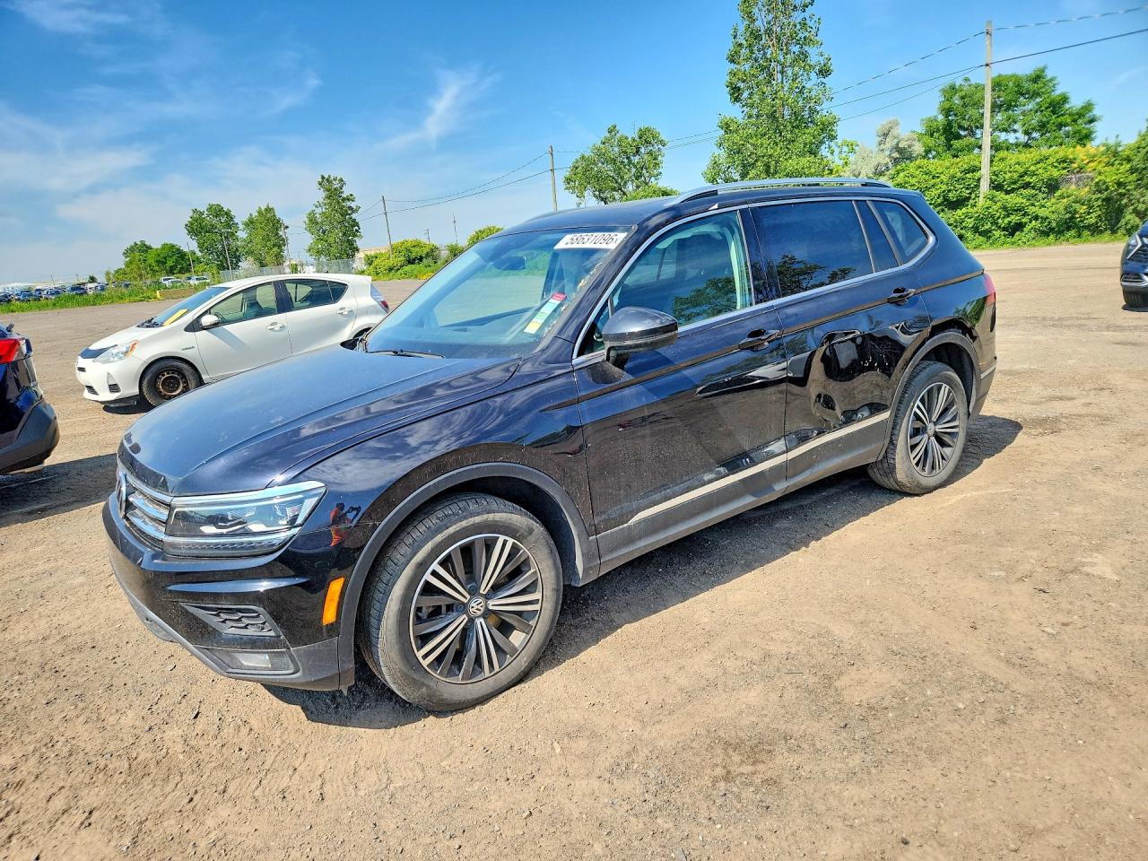 3VV4B7AX0JM185604 · 2018 VOLKSWAGEN TIGUAN
