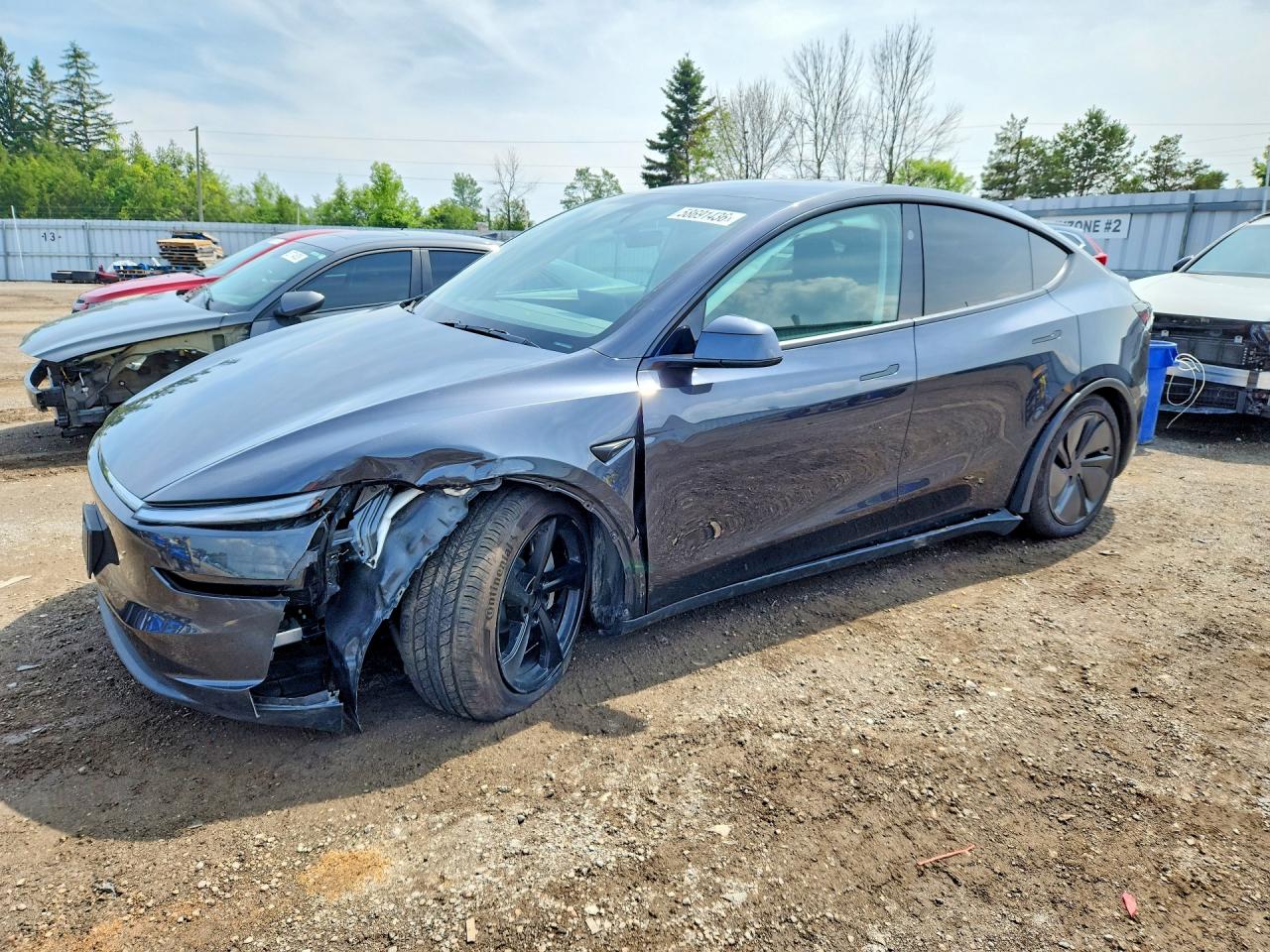 XP7YGDEE0TB761061 · 2026 TESLA MODEL Y
