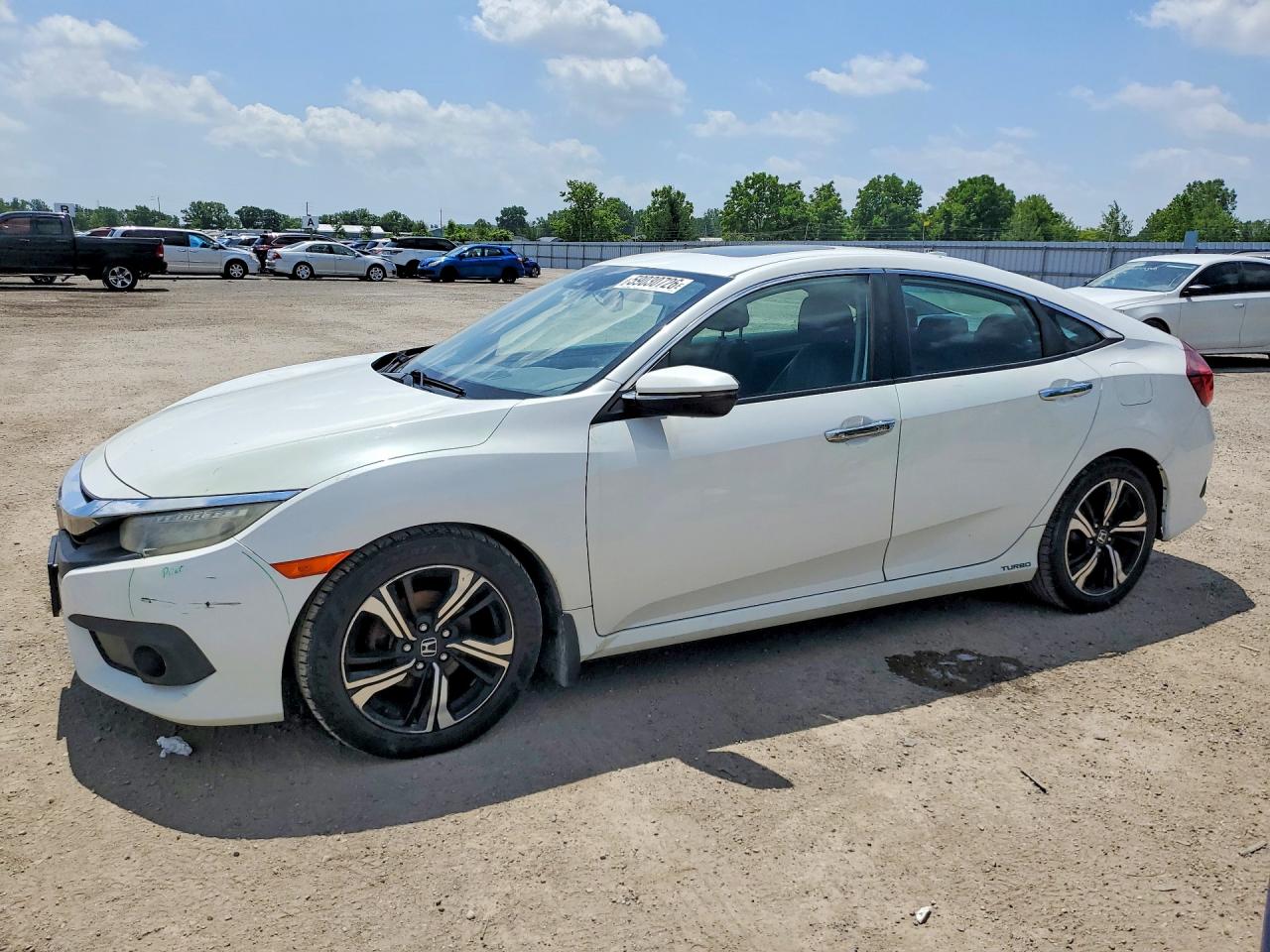 2HGFC1F92GH115025 · 2016 HONDA CIVIC