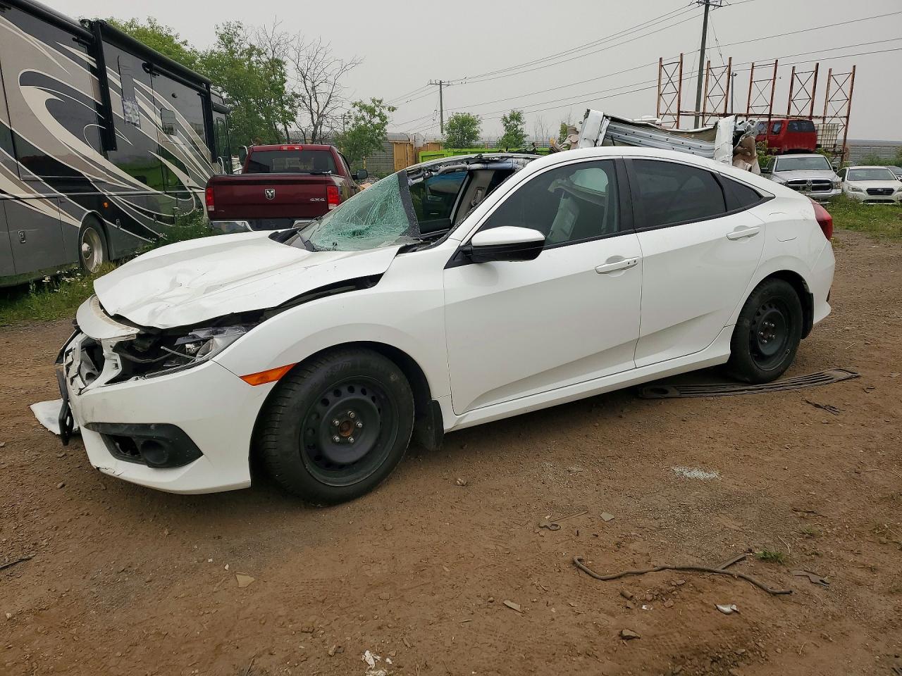 2HGFC2F84JH000995 · 2018 HONDA CIVIC