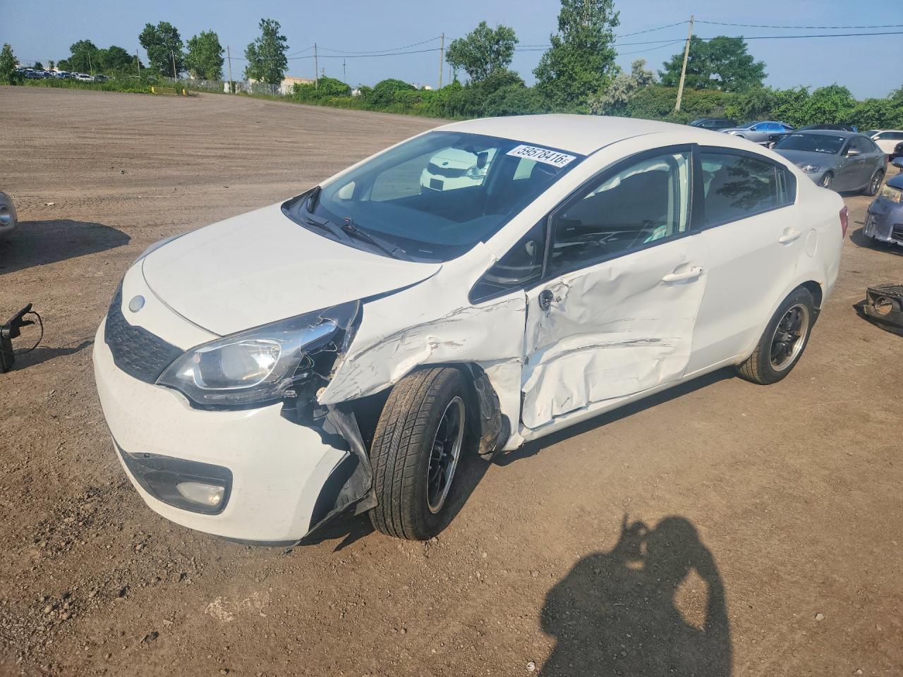 KNADM4A31D6257304 · 2013 KIA RIO