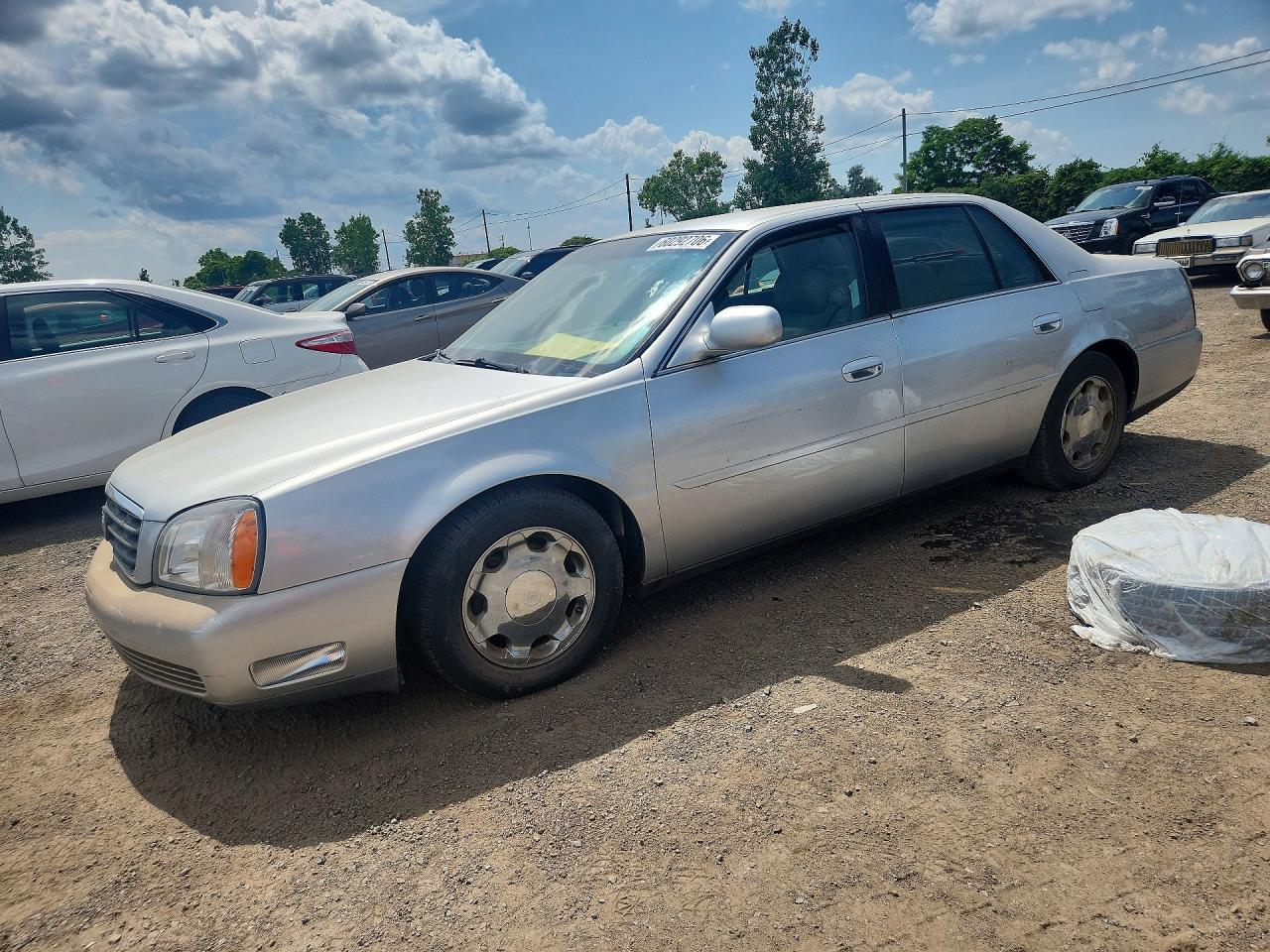 1G6KE54Y9YU295811 · 2000 CADILLAC DEVILLE