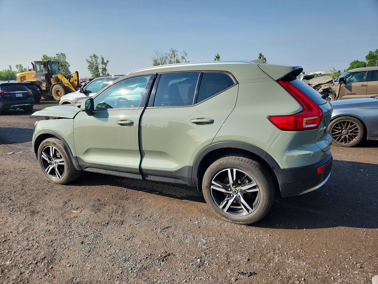 YV4L12UV7P2022942 · 2023 VOLVO XC40 · 2/12