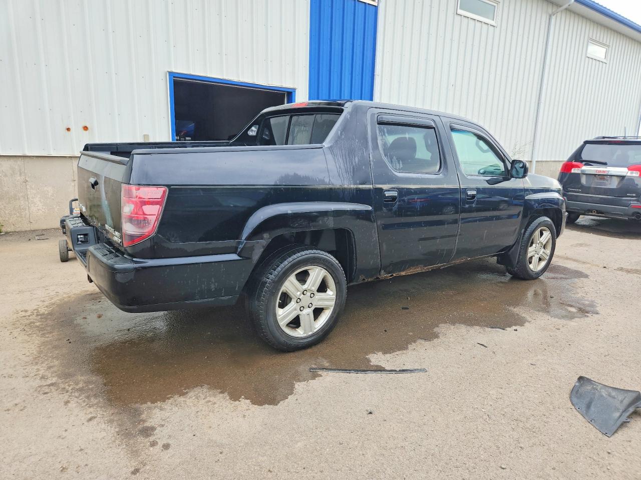 5FPYK1F59AB001471 · 2010 HONDA RIDGELINE · 3/12