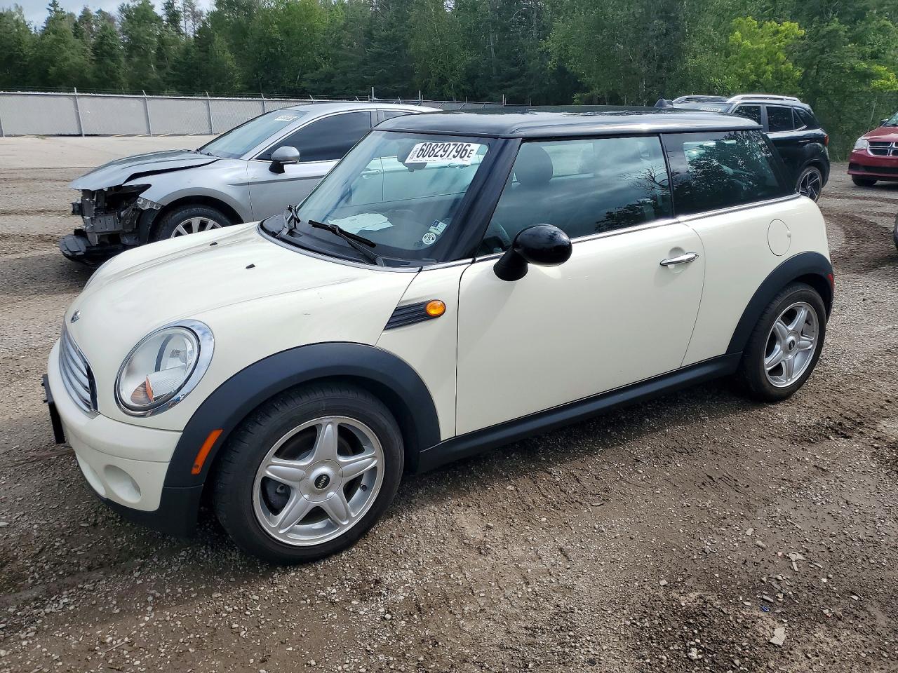 WMWMF33529TT69735 · 2009 MINI COOPER
