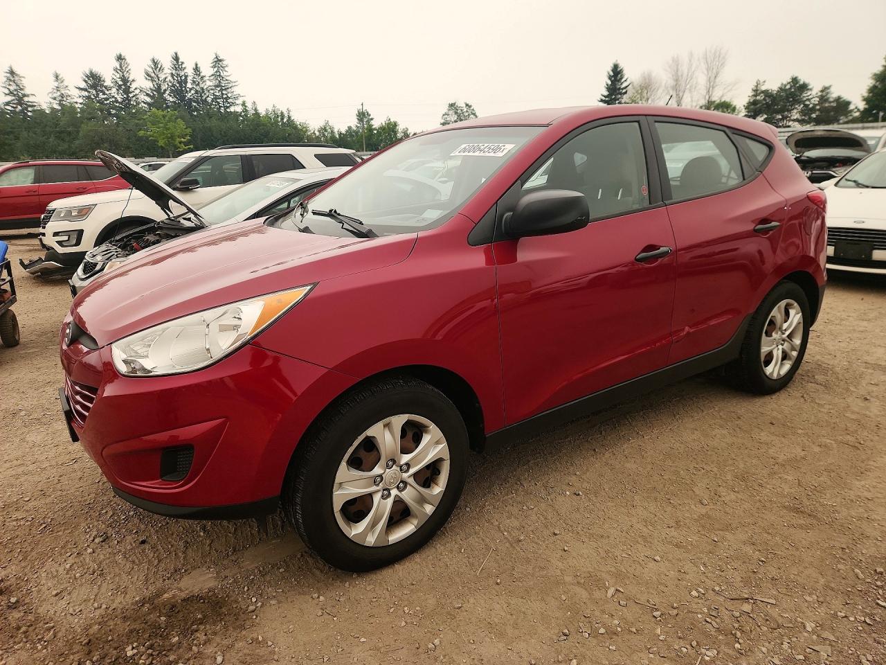 KM8JTCAC7DU646152 · 2013 HYUNDAI TUCSON
