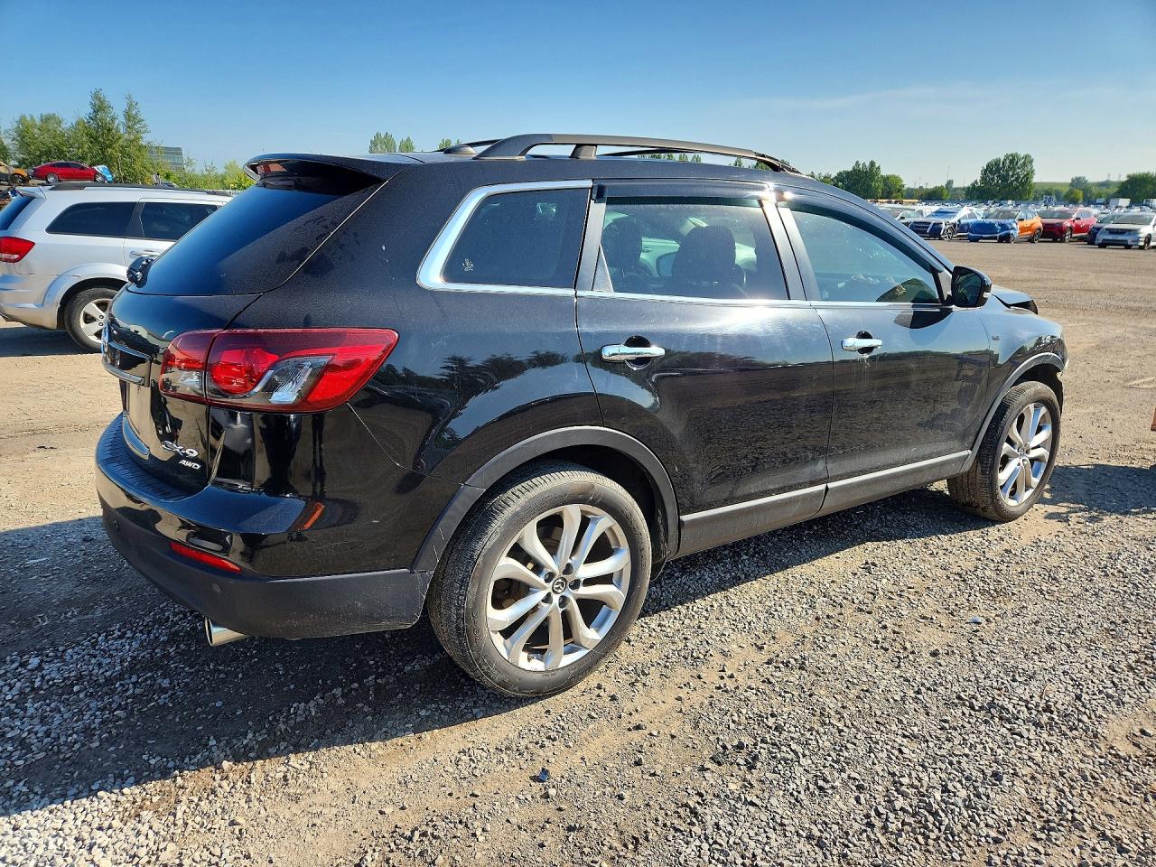 JM3TB3DA8D0409632 · 2013 MAZDA CX-9 · 3/14