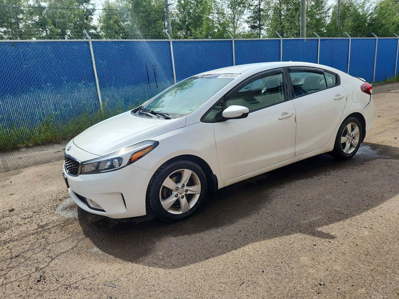 3KPFL4A74JE255439 · 2018 KIA FORTE
