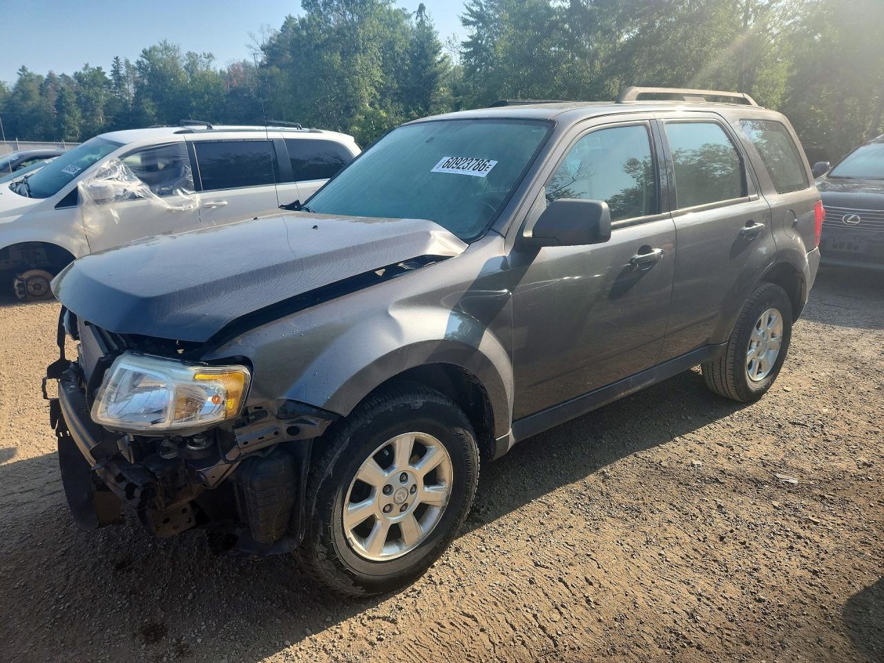 4F2CY9C77BKM02995 · 2011 MAZDA TRIBUTE