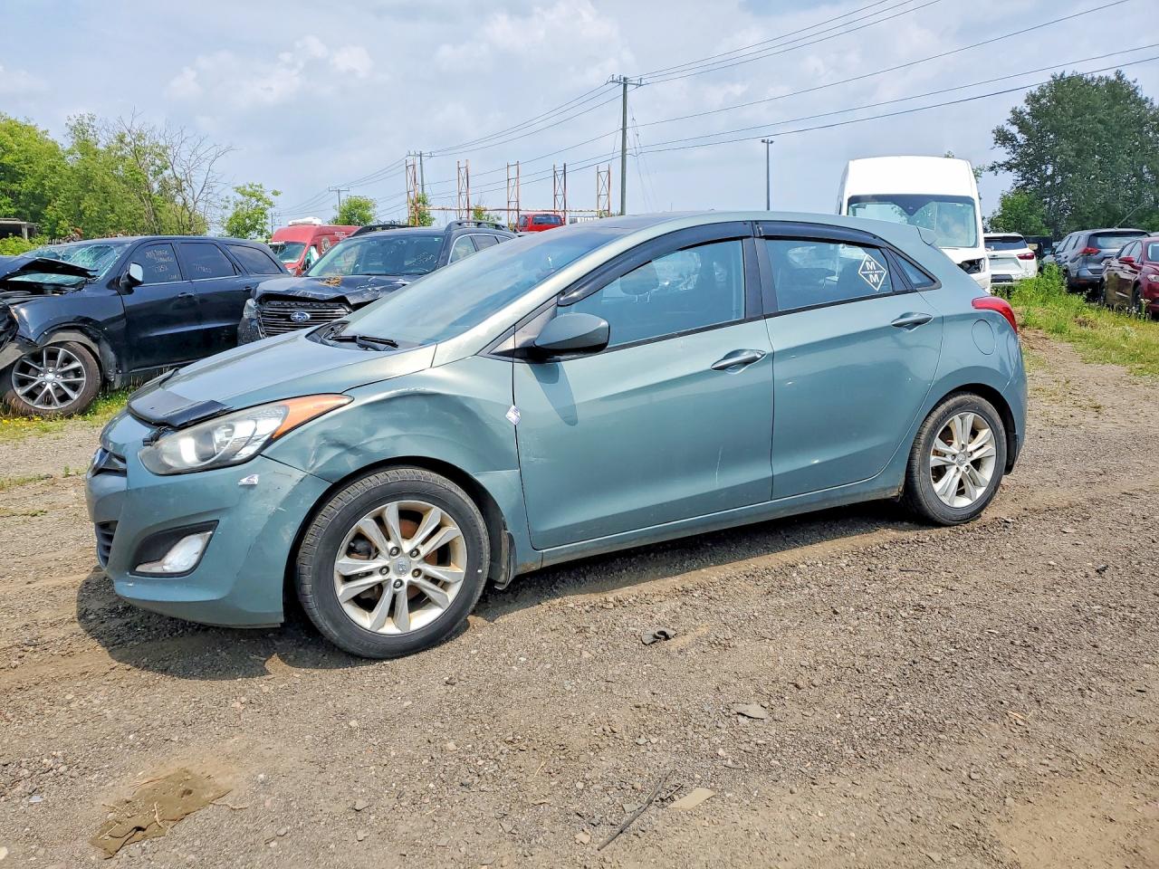 KMHD35LE1DU023424 · 2013 HYUNDAI ELANTRA GT
