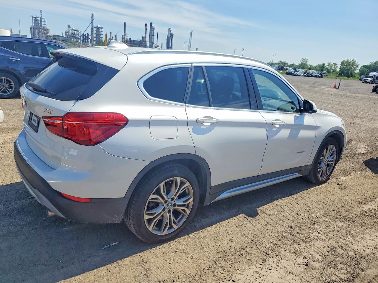 WBXHT3C34J5F91283 · 2018 BMW X1 · 3/13