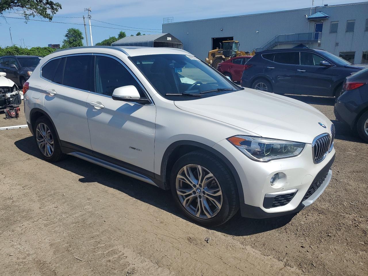 WBXHT3C34J5F91283 · 2018 BMW X1 · 4/13