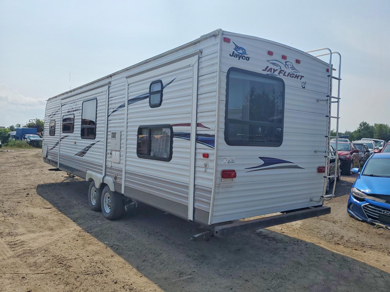 1UJBJ0BS7B1EG0174 · 2011 JAYCO M-32 BHDS · 2/9