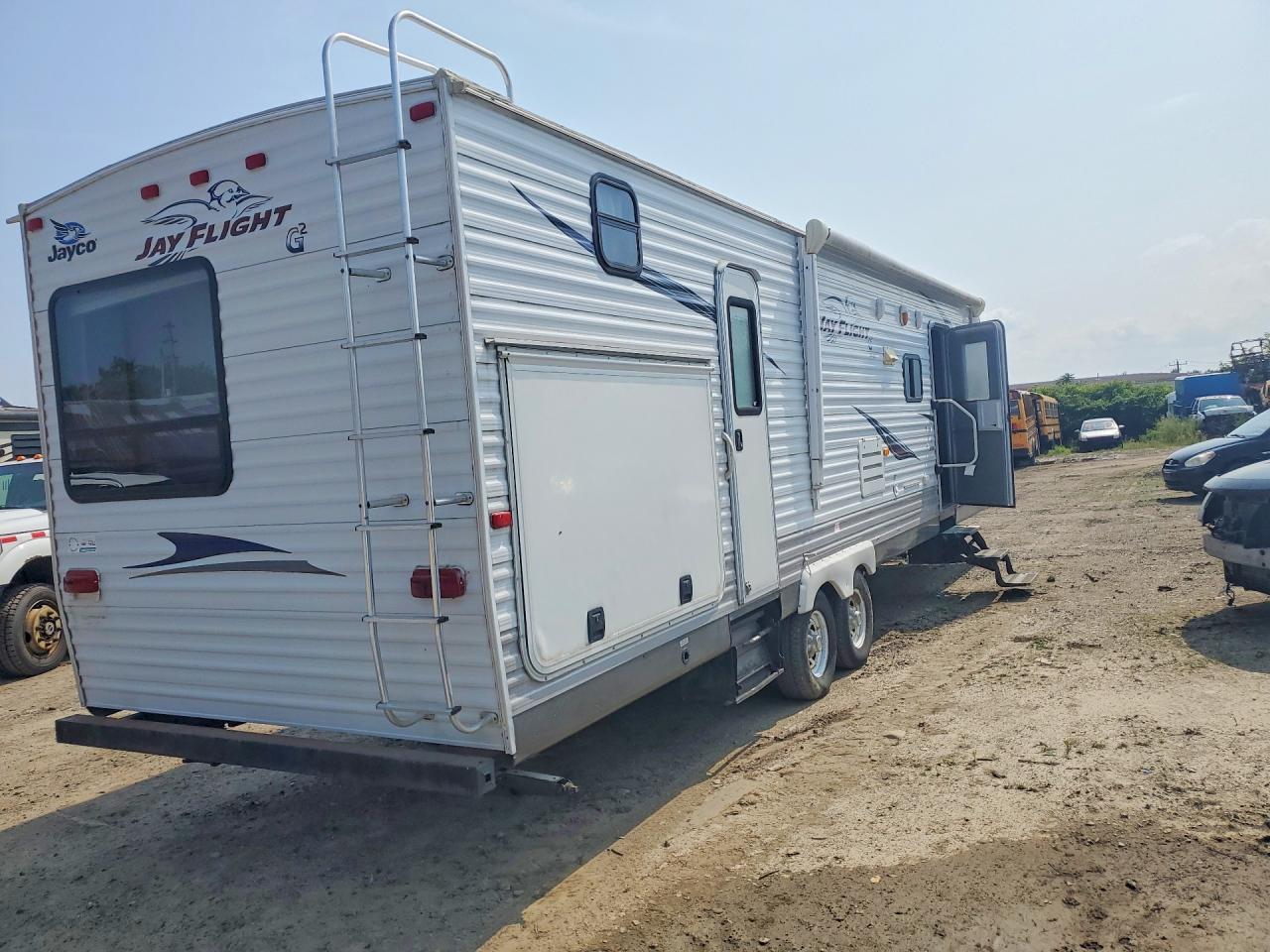 1UJBJ0BS7B1EG0174 · 2011 JAYCO M-32 BHDS · 3/9