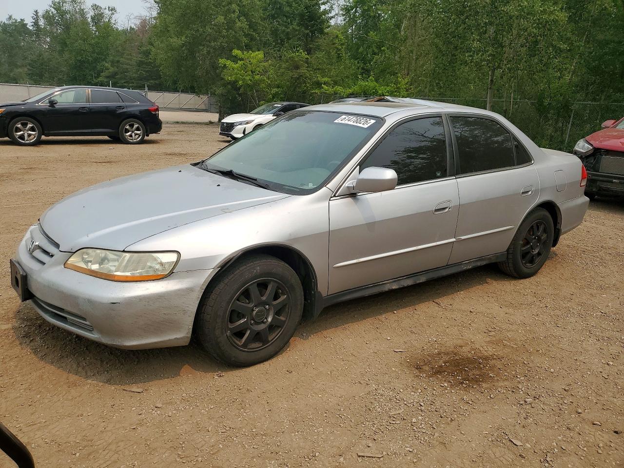 1HGCG56732A****** · 2002 HONDA ACCORD