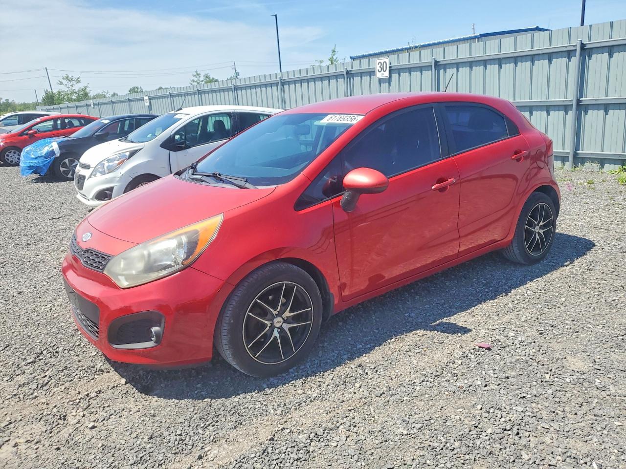 KNADM5A35C6735521 · 2012 KIA RIO