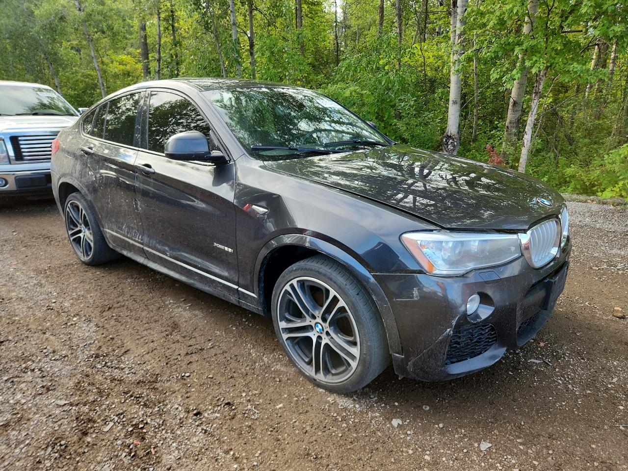 5UXXW3C58J0Y65840 · 2018 BMW X4 · 4/13
