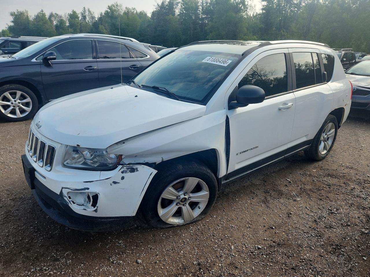 1C4NJCAB8CD594709 · 2012 JEEP COMPASS