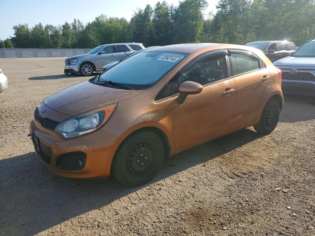 KNADM5A35C6756031 · 2012 KIA RIO
