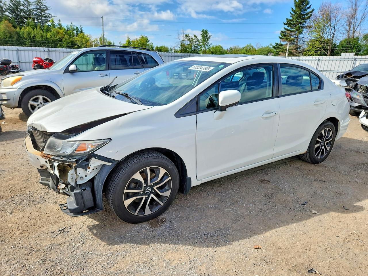 2HGFB2F56FH037210 · 2015 HONDA CIVIC