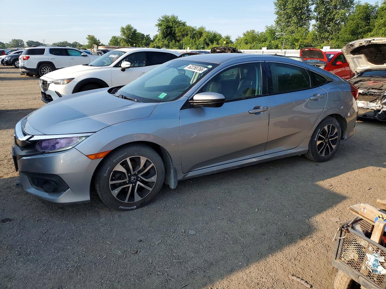 2HGFC2F64JH032330 · 2018 HONDA CIVIC