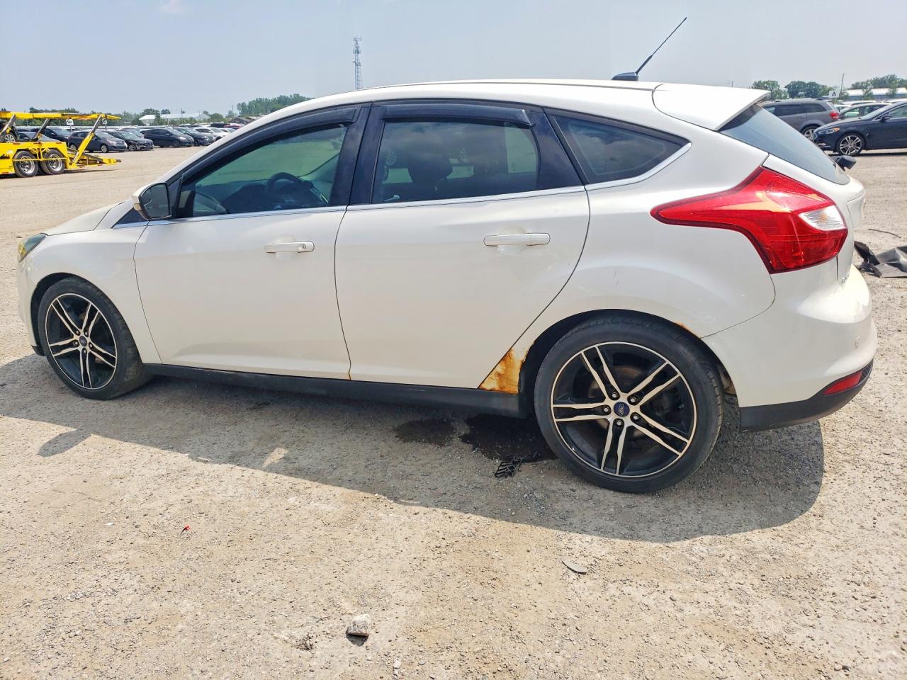 1FAHP3M21CL344795 · 2012 FORD FOCUS · 2/12