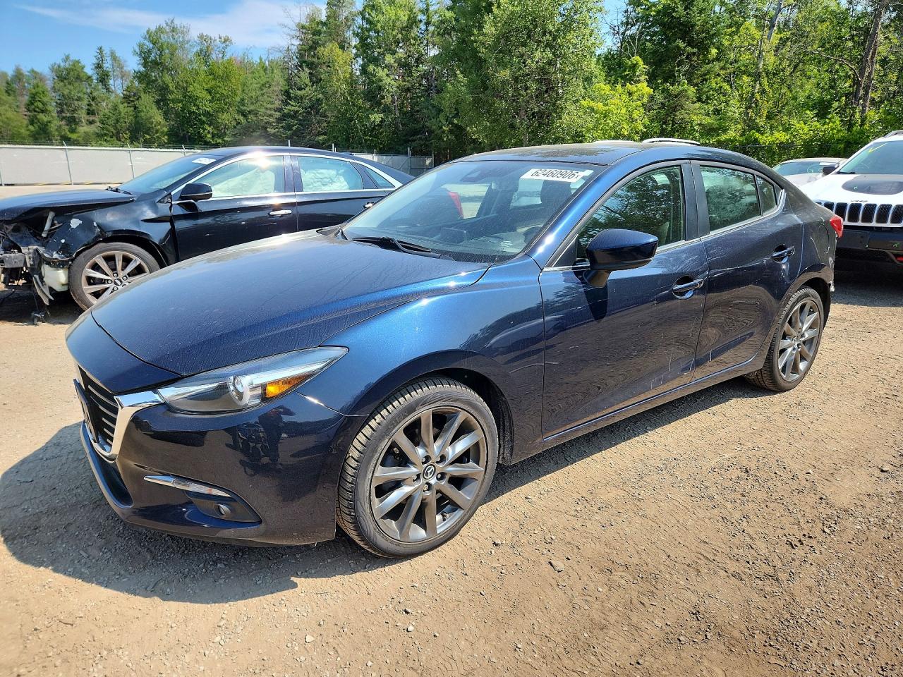 3MZBN1W34JM167426 · 2018 MAZDA 3