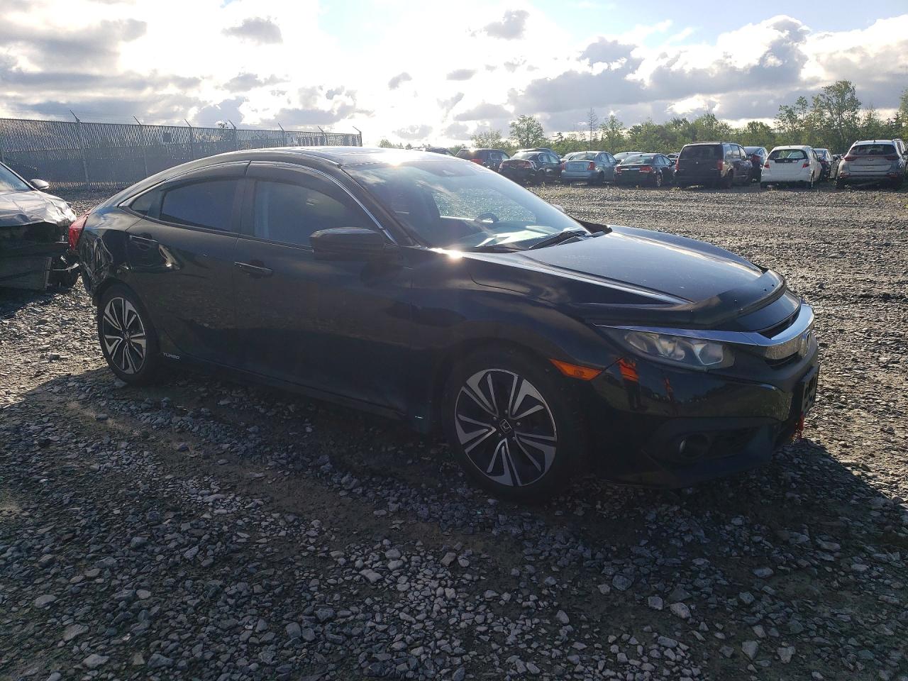 2HGFC1F49GH104995 · 2016 HONDA CIVIC · 4/13