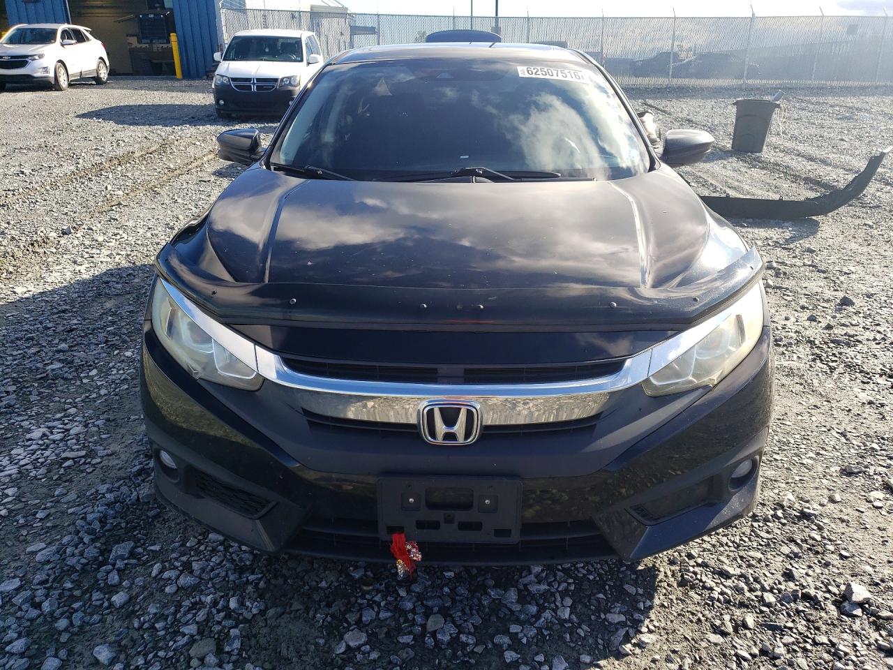 2HGFC1F49GH104995 · 2016 HONDA CIVIC · 5/13