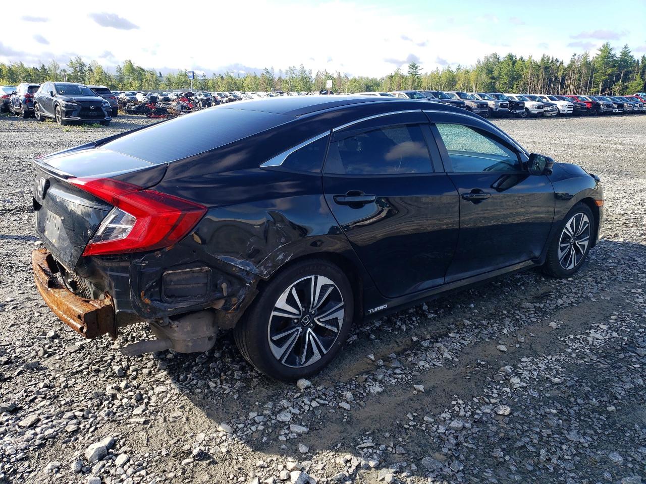 2HGFC1F49GH104995 · 2016 HONDA CIVIC · 3/13