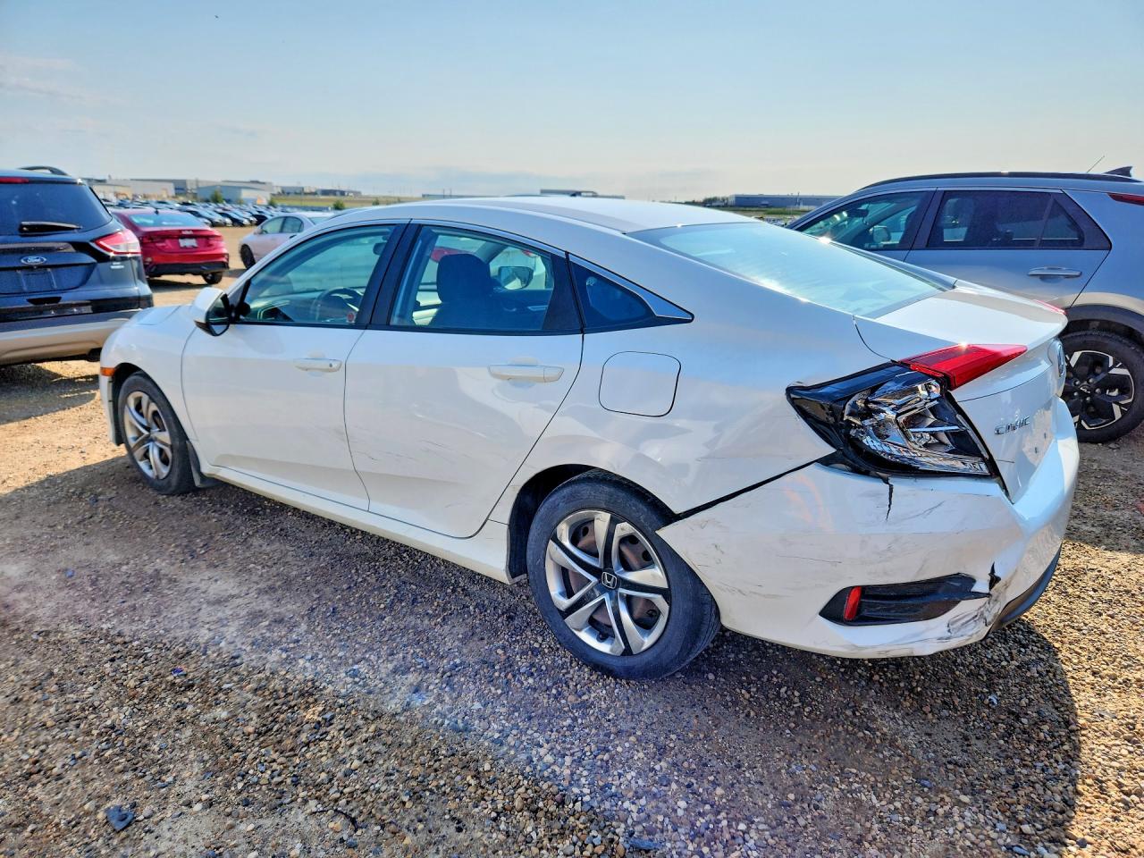 2HGFC2F52GH018510 · 2016 HONDA CIVIC · 2/12