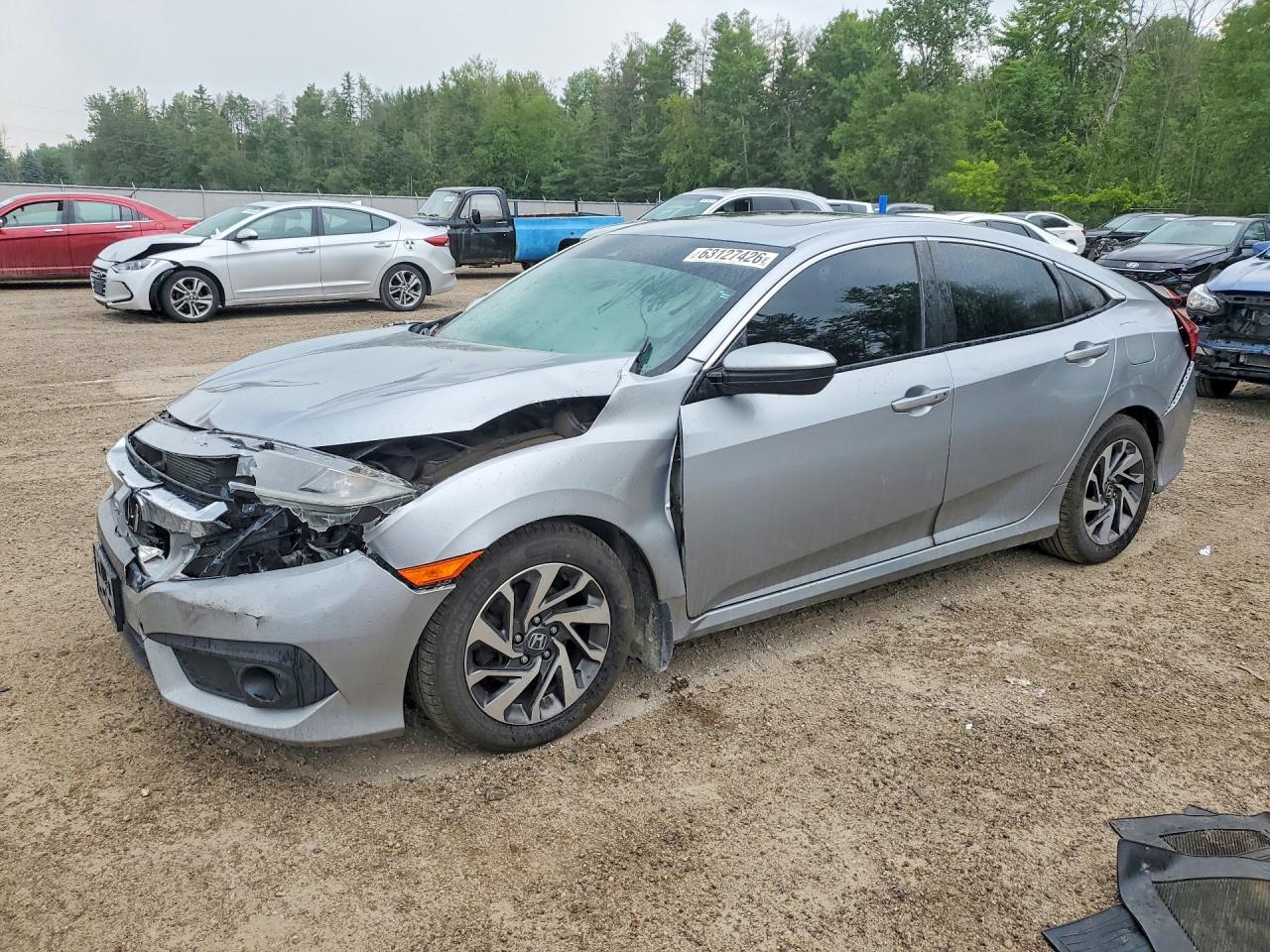 2HGFC2F8XJH039820 · 2018 HONDA CIVIC
