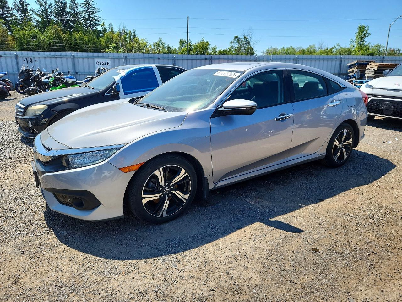 2HGFC1F90JH102751 · 2018 HONDA CIVIC