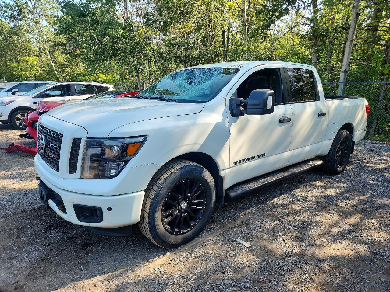 1N6AA1E54JN517895 · 2018 NISSAN TITAN