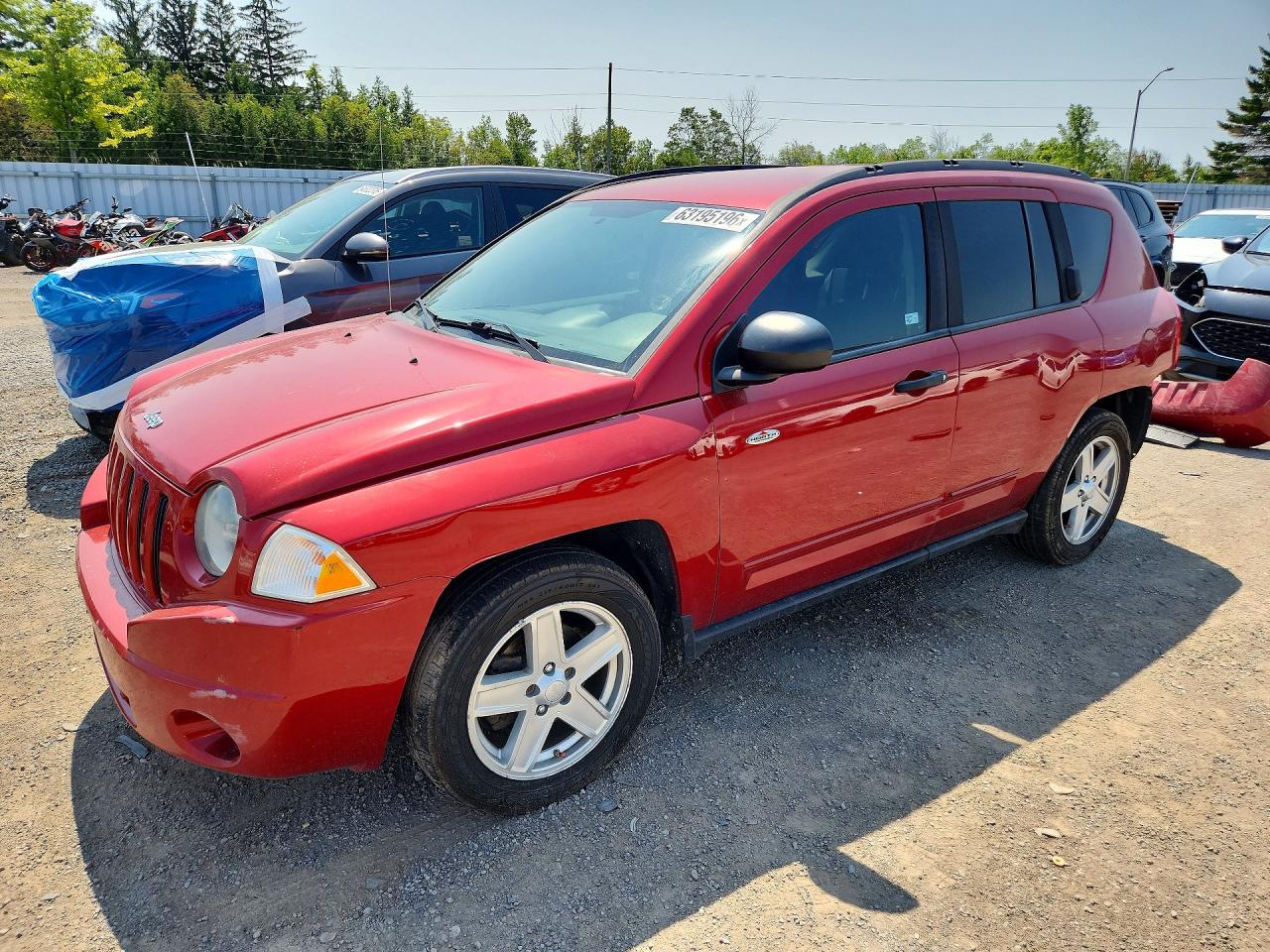 1J8FT47B39D211322 · 2009 JEEP COMPASS