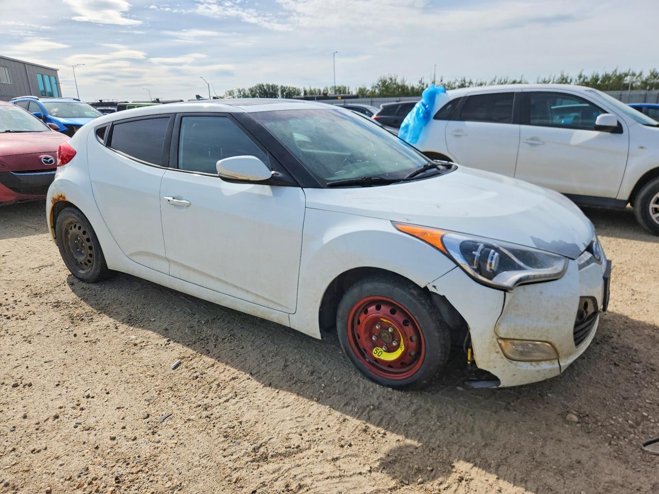 KMHTC6AD1GU261466 · 2016 HYUNDAI VELOSTER · 4/12